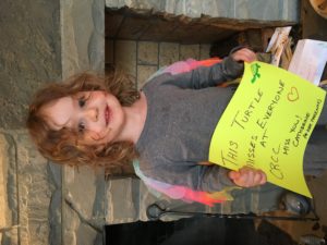 A child celebrates Teacher Appreciation Week at Coddington Road Community Center 